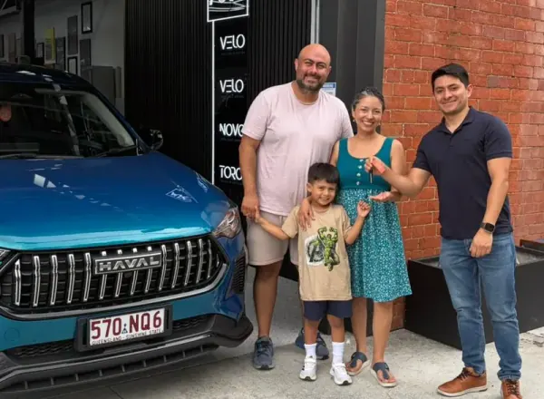Family receiving their new car